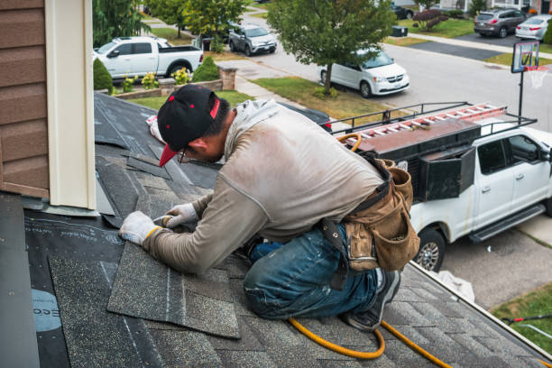 Professional Flat Roof Repair technician working in Point Harbor, NC
